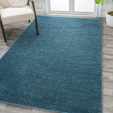 Haze Solid Low-pile Area Rug Turquoise
